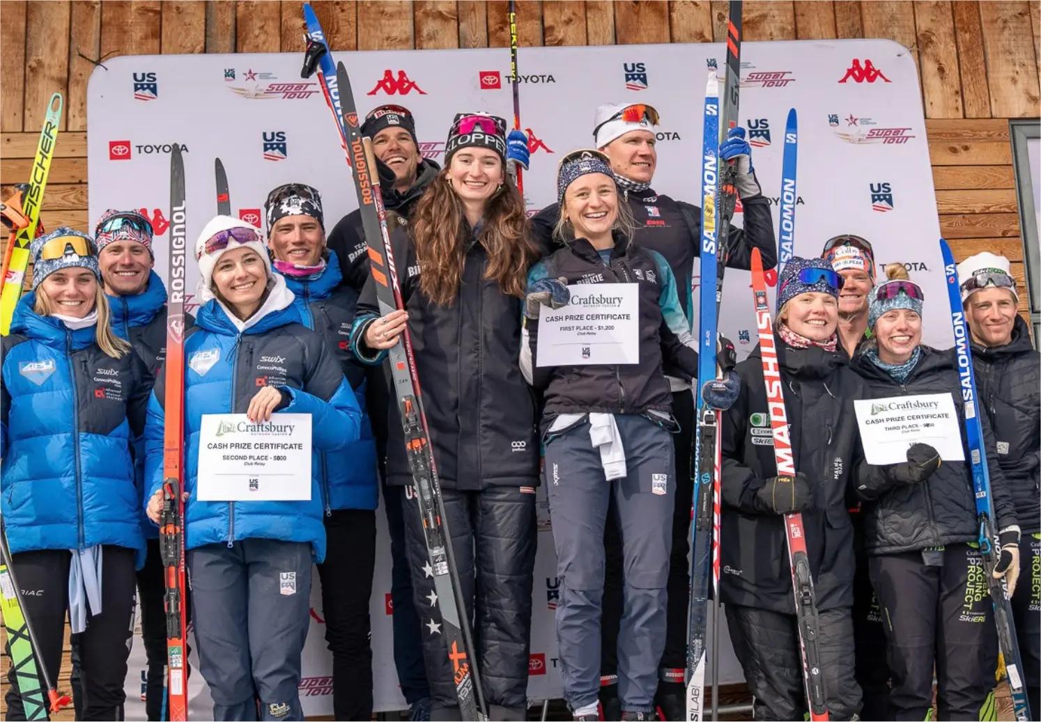 Snø Racing athletes celebrating on the podium after winning the Club Relay at the 2026 U.S. Nationals Super Finals